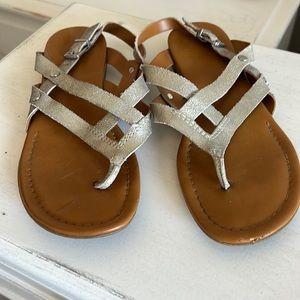 Flat metallic silver sandals